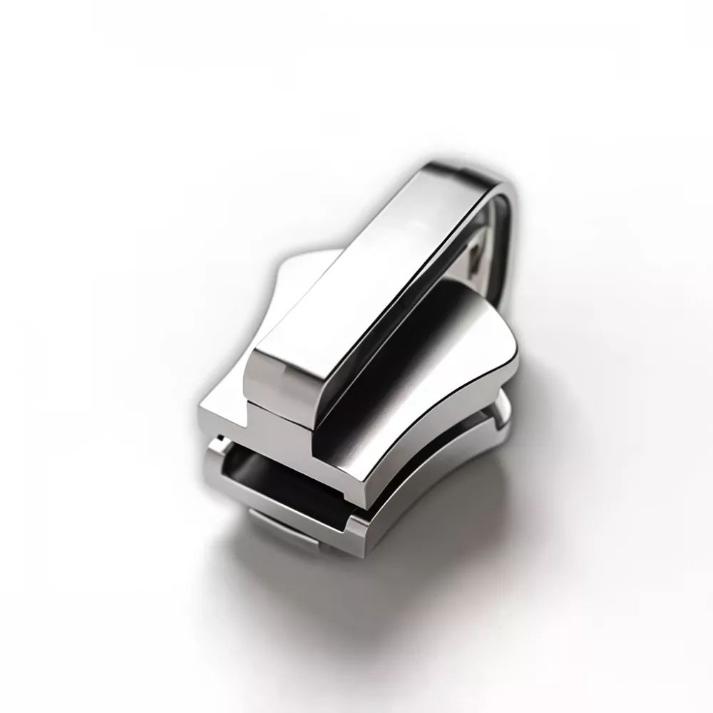 Cursore reversibile per cerniera in metallo