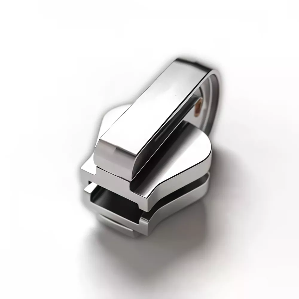 Cursore reversibile per cerniera in plastica